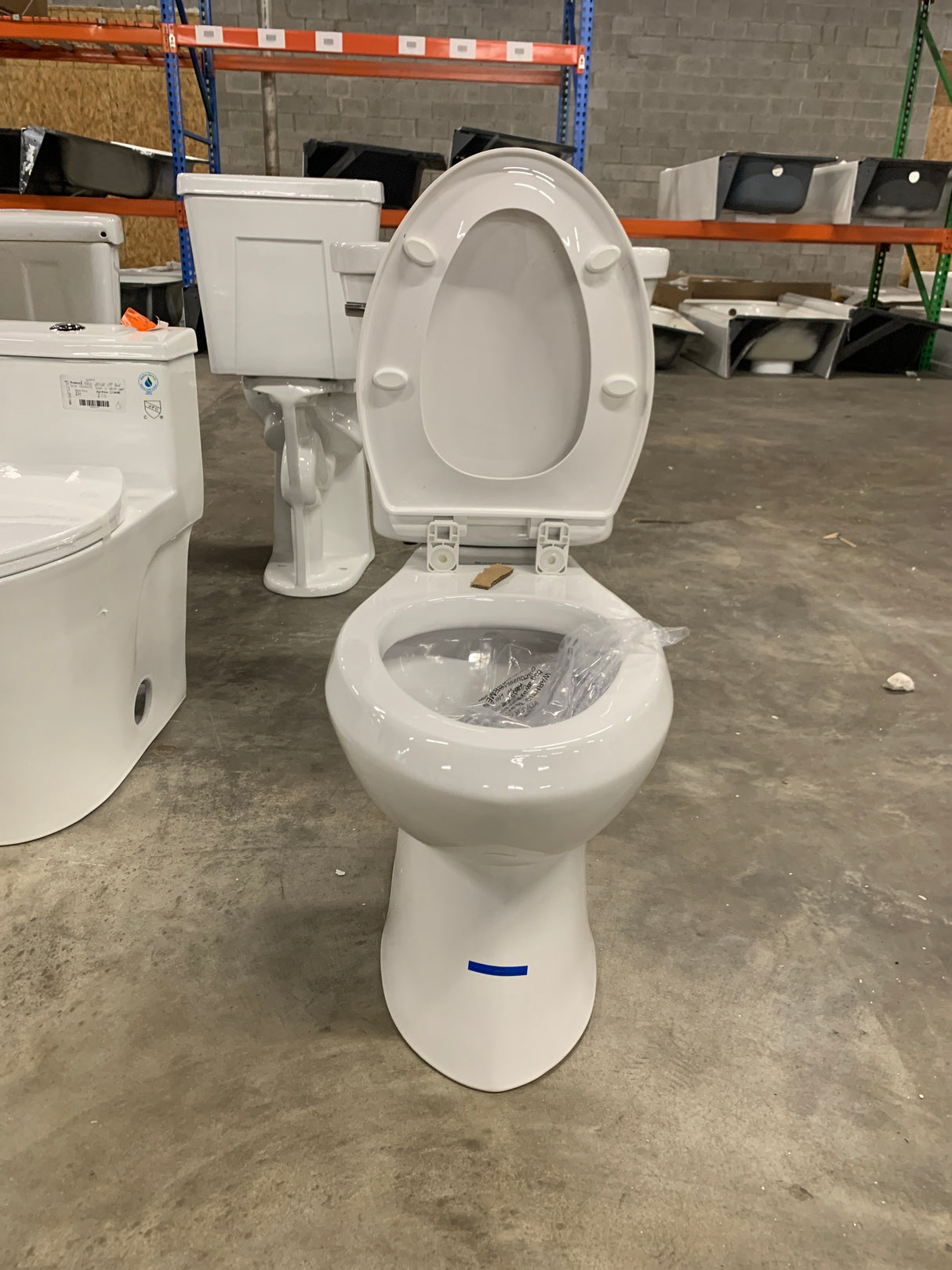 2-piece 1.1 GPF/1.6 GPF Dual Flush Round Toilet in White