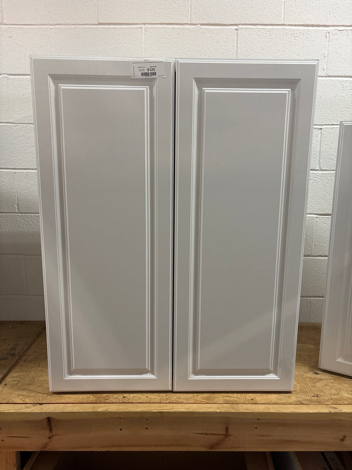 Hampton 33 in. W x 12 in. D x 42 in. H Assembled Wall Cabinet in Satin White
