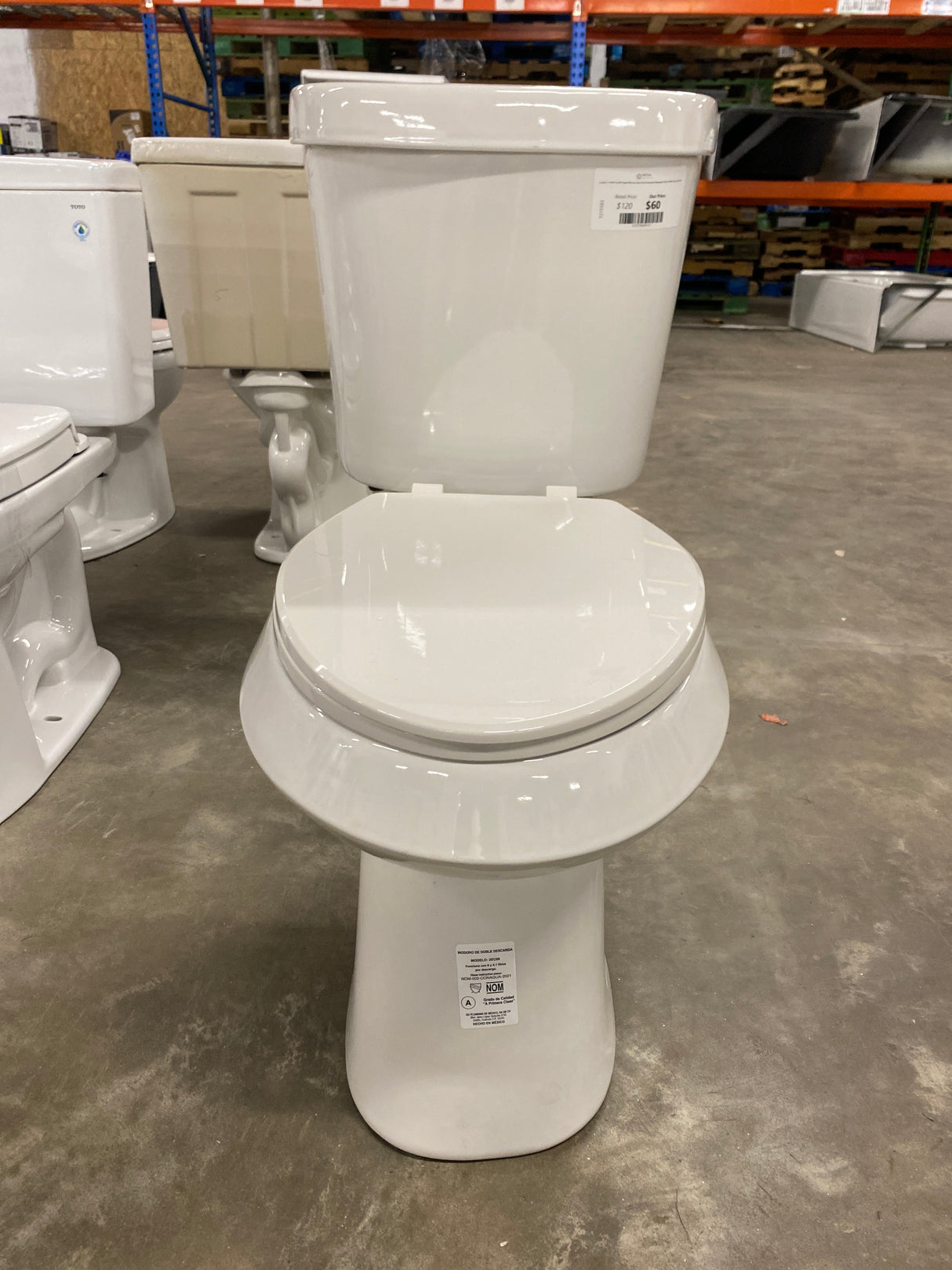 2-piece 1.1 GPF/1.6 GPF High Efficiency Dual Flush Complete Elongated Toilet in White, Seat Included