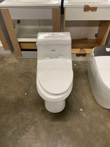 Colony 1-Piece 1.28 GPF Single Flush Elongated Toilet in White Seat Included