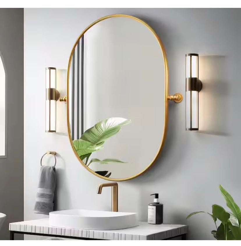 23 in. W x 31 in. H Oval Metal Framed Pivoted Bathroom Wall Vanity Mirror in Gold