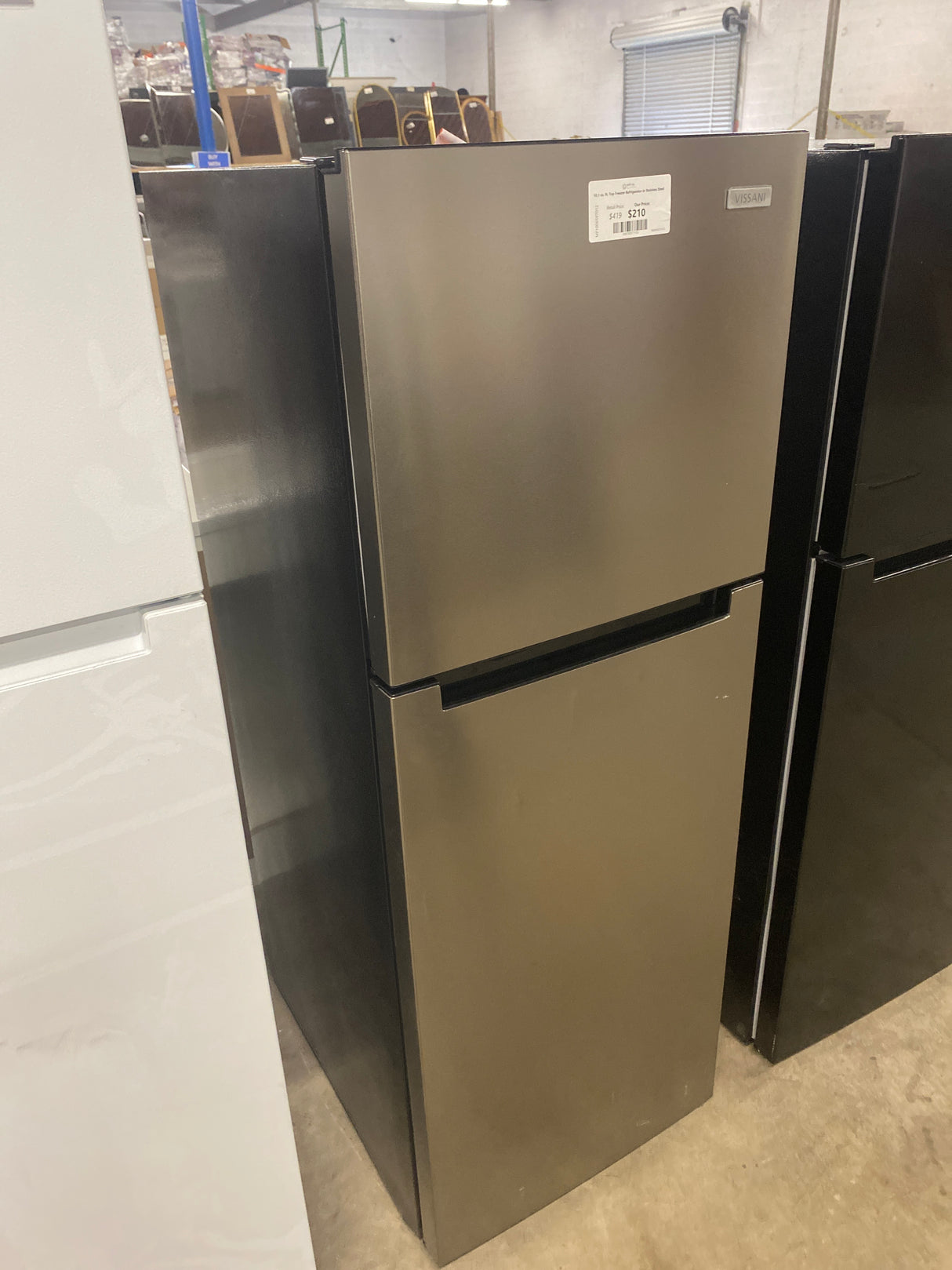 10.1 cu. ft. Top Freezer Refrigerator in Stainless Steel