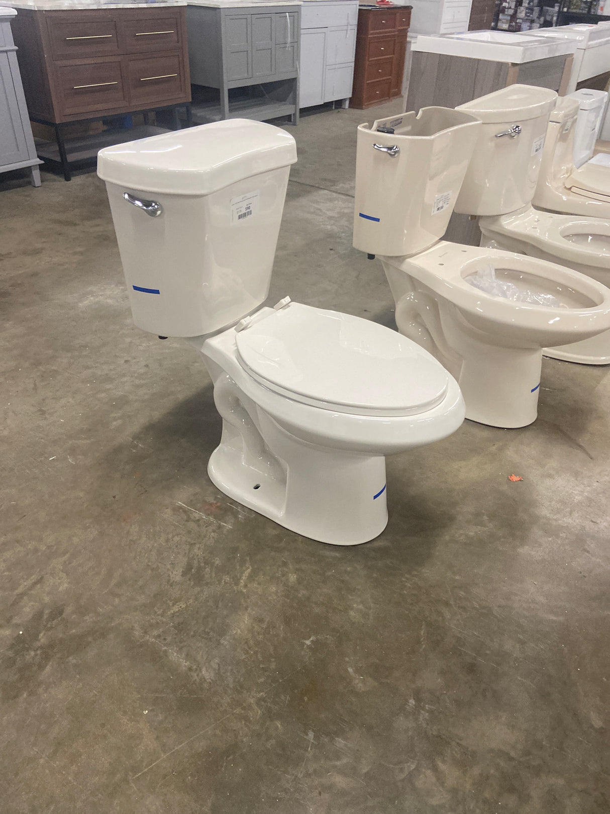 2-piece 1.28 GPF High Efficiency Single Flush Elongated Toilet in Biscuit