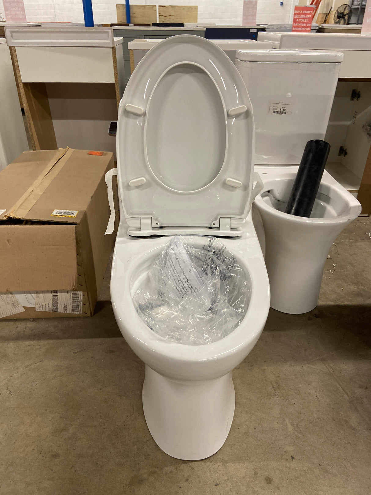 UltraMax II 1-Piece 1.28 GPF Single Flush Elongated ADA Comfort Height Toilet in Cotton White Seat Included