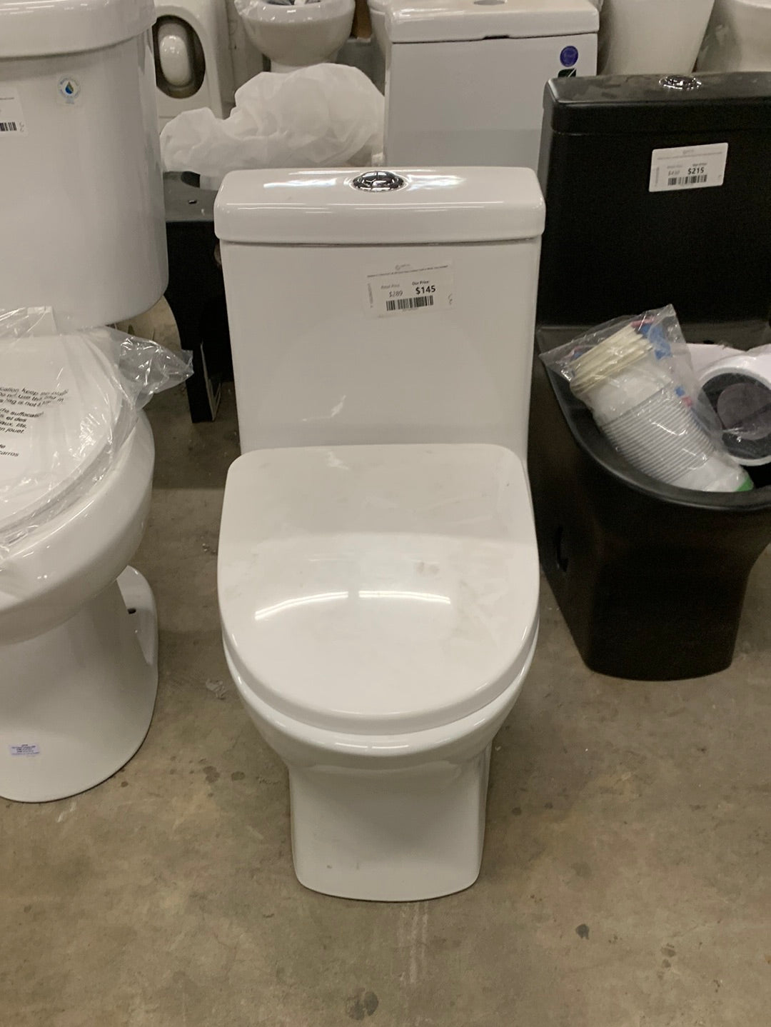 Sublime II 1-Piece 0.8/1.28 GPF Dual Flush Compact Toilet in White, Seat Included