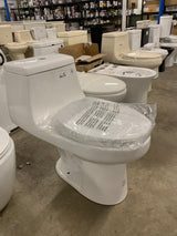 1-piece 1.1 GPF/1.6 GPF High Efficiency Dual Flush Elongated Toilet in White Slow-Close, Seat Included