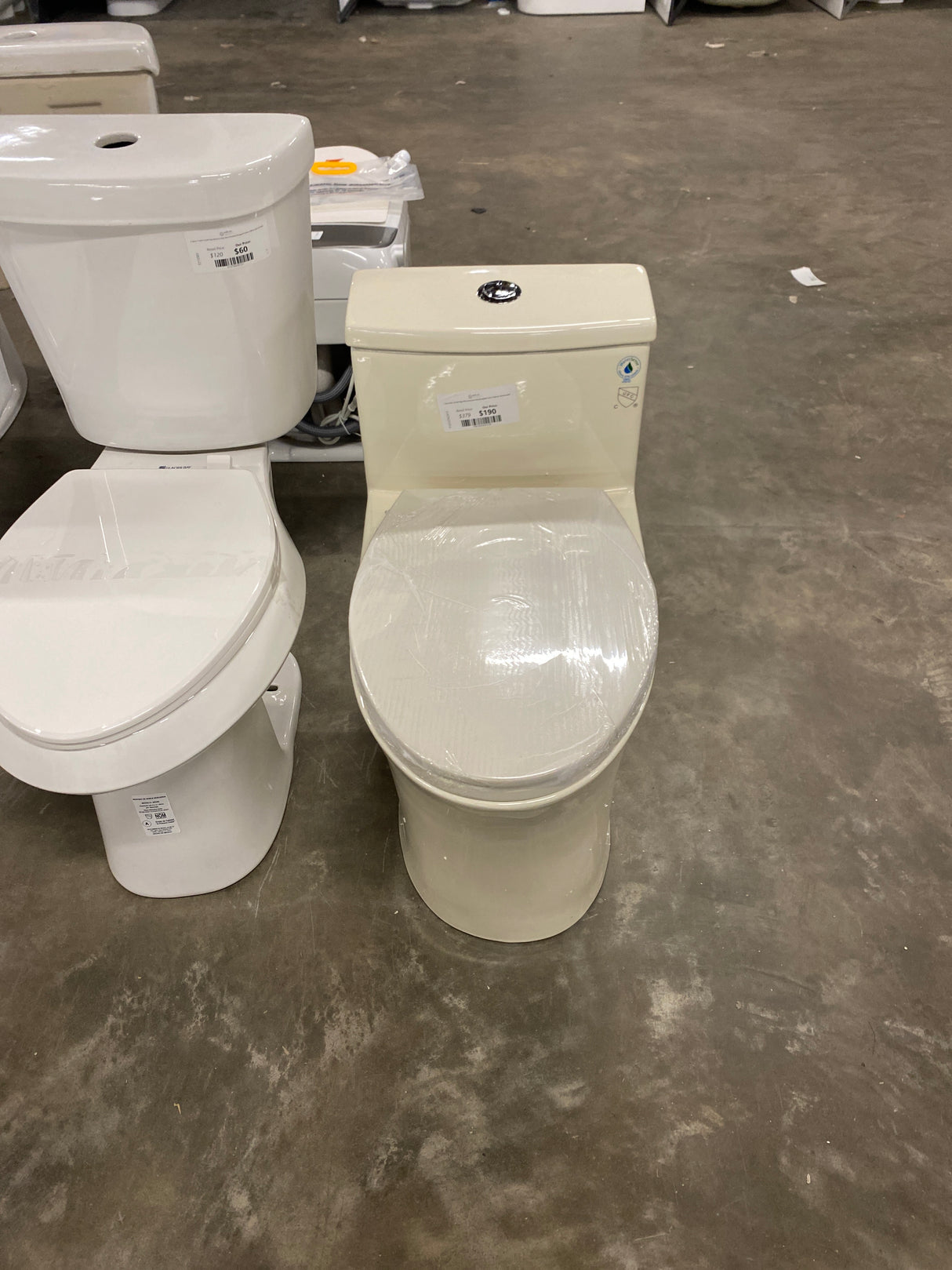 1-piece 0.8/1.28 GPF High Efficiency Dual Flush Elongated Toilet in Biscuit, Seat Included