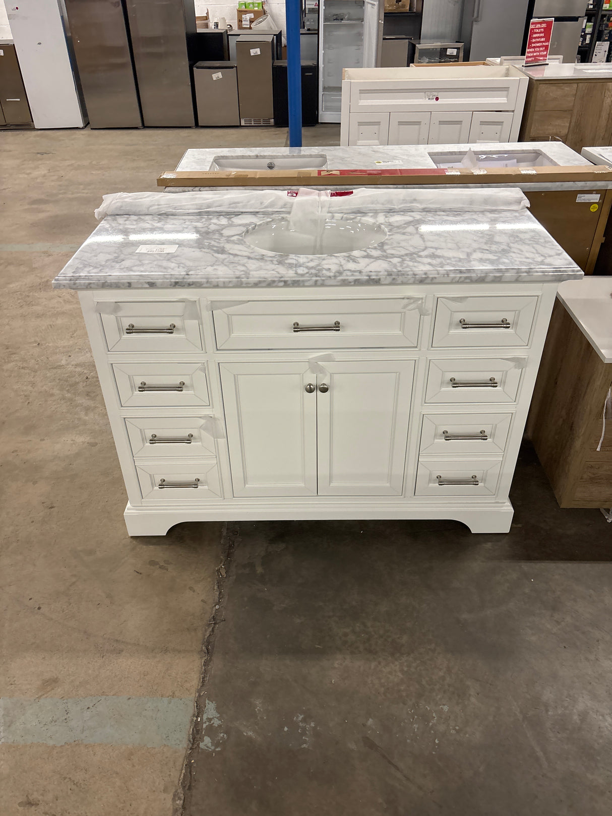 Windlowe 49 in. W x 22 in. D x 35 in. H Freestanding Bath Vanity in White with Carrara White Marble Top