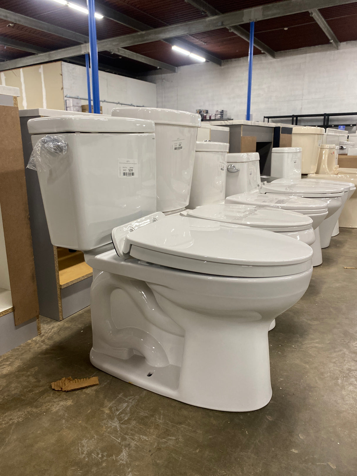 Drake 2-Piece 1.6 GPF Single Flush Elongated ADA Comfort Height Toilet in Cotton White, SoftClose Seat Included