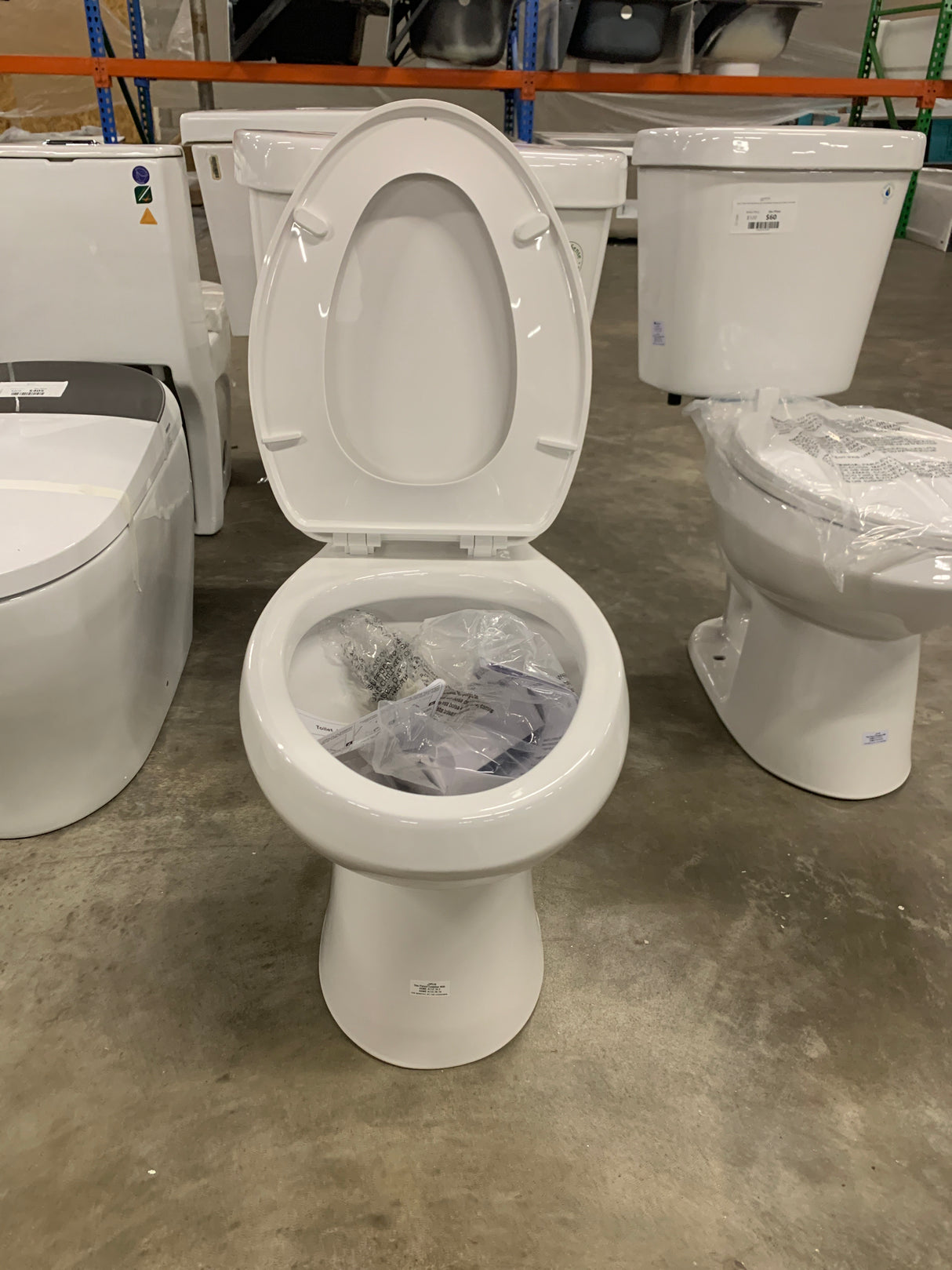 2-piece 1.1 GPF/1.6 GPF High Efficiency Dual Flush Complete Elongated Toilet in White, Seat Included