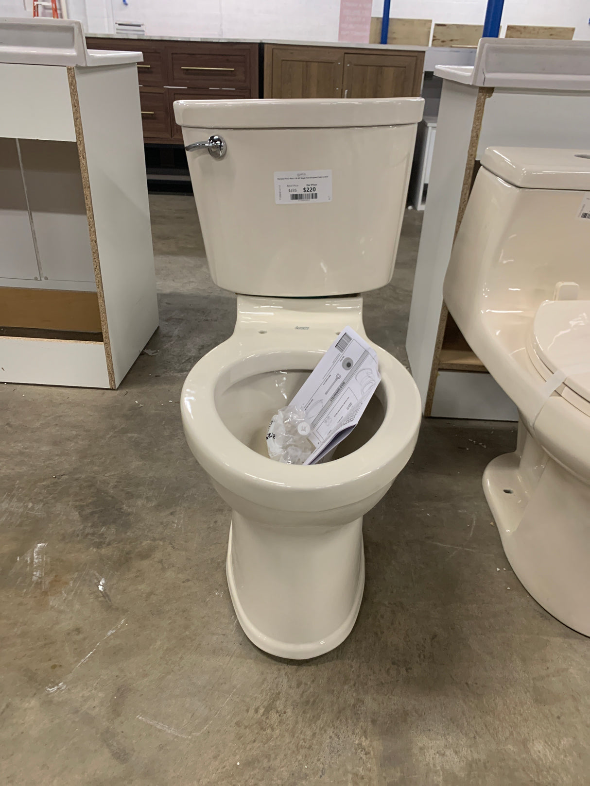 Champion Pro 2-Piece 1.28 GPF Single Flush Elongated Toilet in Bone