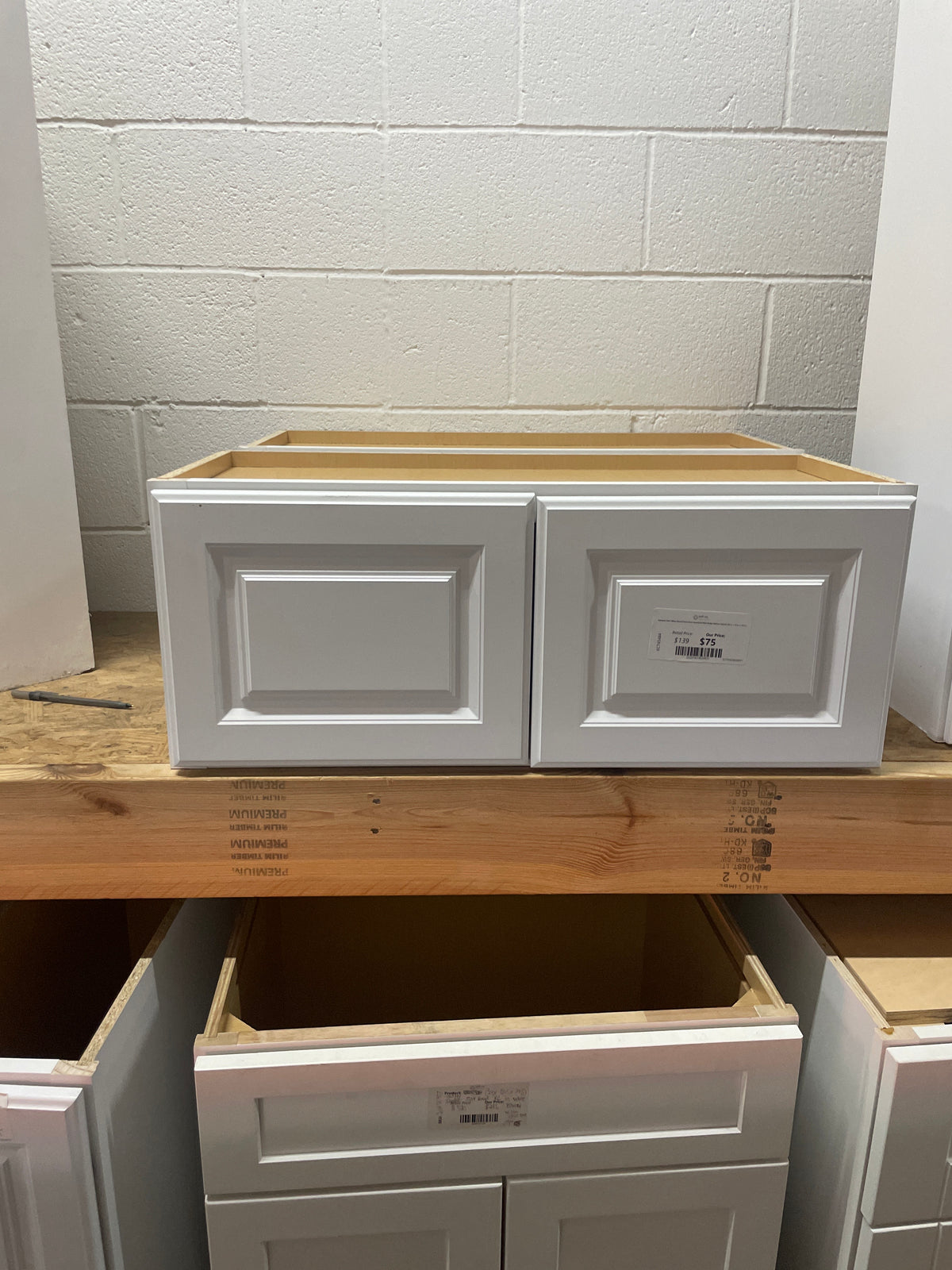 Hampton Satin White Raised Panel Stock Assembled Wall Bridge Kitchen Cabinet (30 in. x 12 in. x 12 in.)
