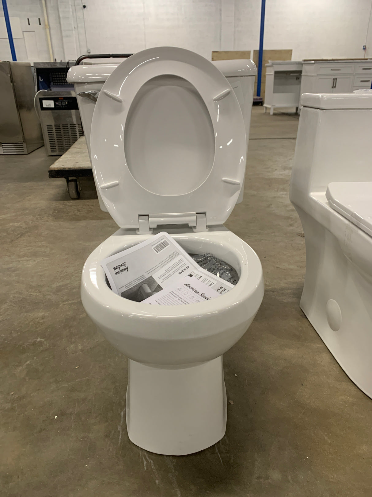 Reliant 10 in. Rough-In 2-Piece 1.28 GPF Single Flush Round Toilet in White, Seat Included