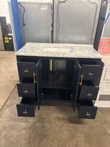 Sturgess 43 in. W x 22 in. D x 35 in. H Single Sink Freestanding Bath Vanity in Navy Blue with Carrara Marble Top ( Comes With One Free Toilet Or Mirror Valued Up To $100)