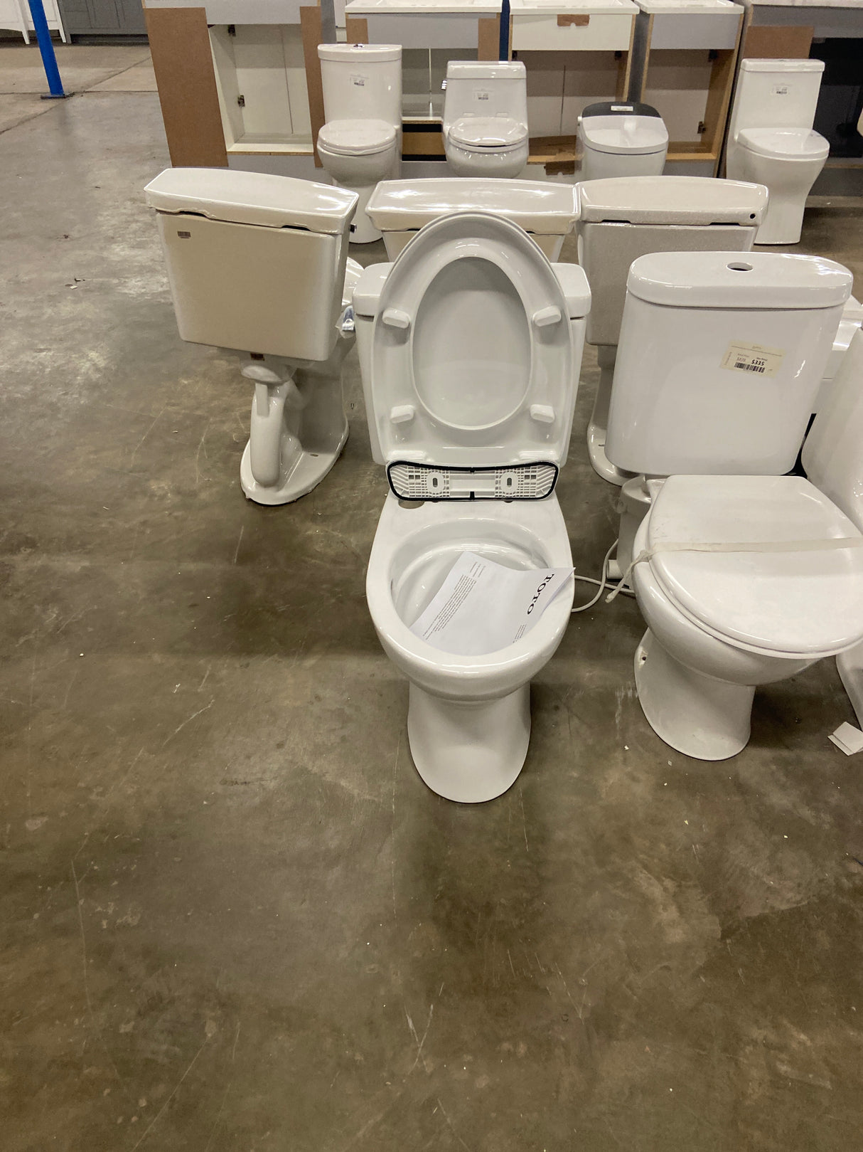 Drake 2-Piece 1.6 GPF Single Flush Elongated ADA Comfort Height Toilet in Cotton White, SoftClose Seat Included