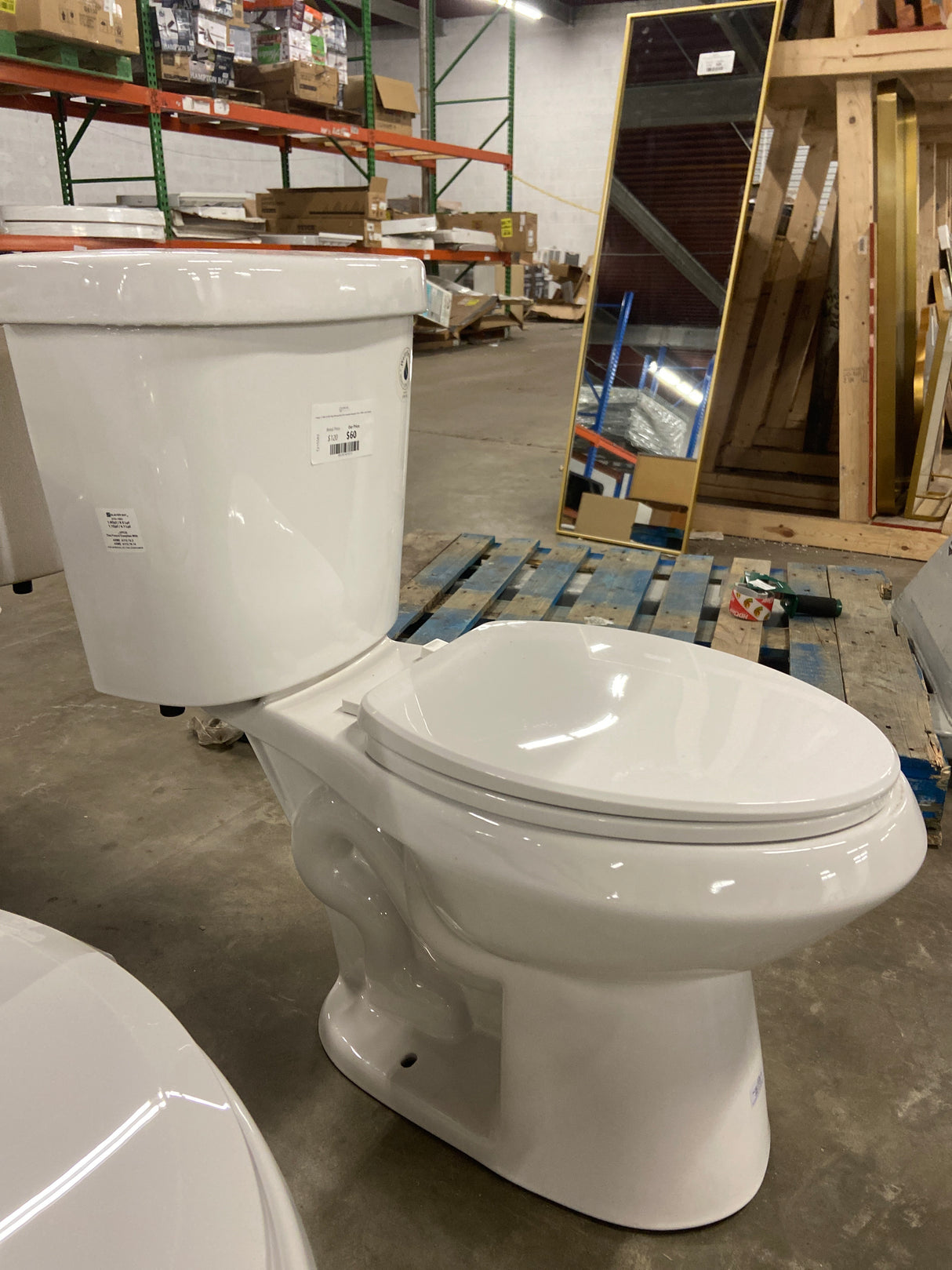 2-piece 1.1 GPF/1.6 GPF High Efficiency Dual Flush Complete Elongated Toilet in White, Seat Included