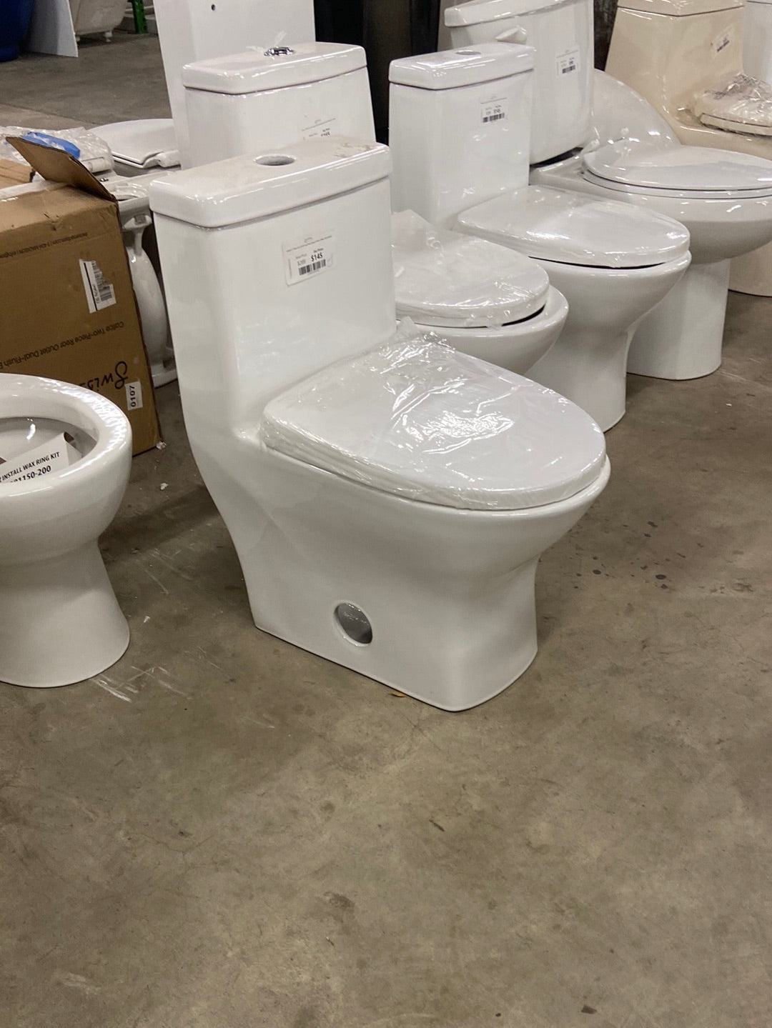 Sublime II 1-Piece 0.8/1.28 GPF Dual Flush Compact Toilet in White, Seat Included