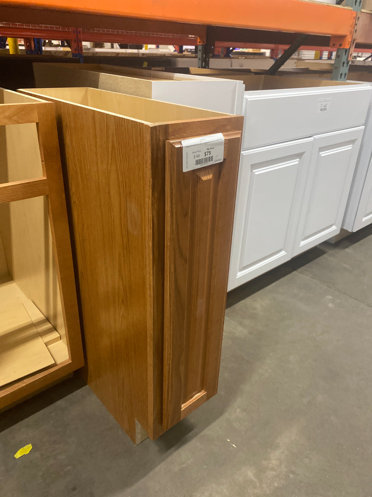 Hampton 9 in. W x 24 in. D x 34.5 in. H Assembled Base Cabinet in Medium Oak