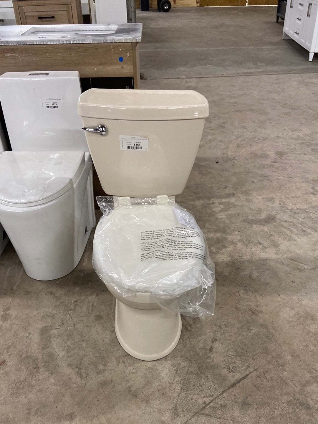 Champion 4 HET Tall Height 2-Piece 1.28 GPF Single Flush High-Efficiency Elongated Toilet in Bone, Seat not Included