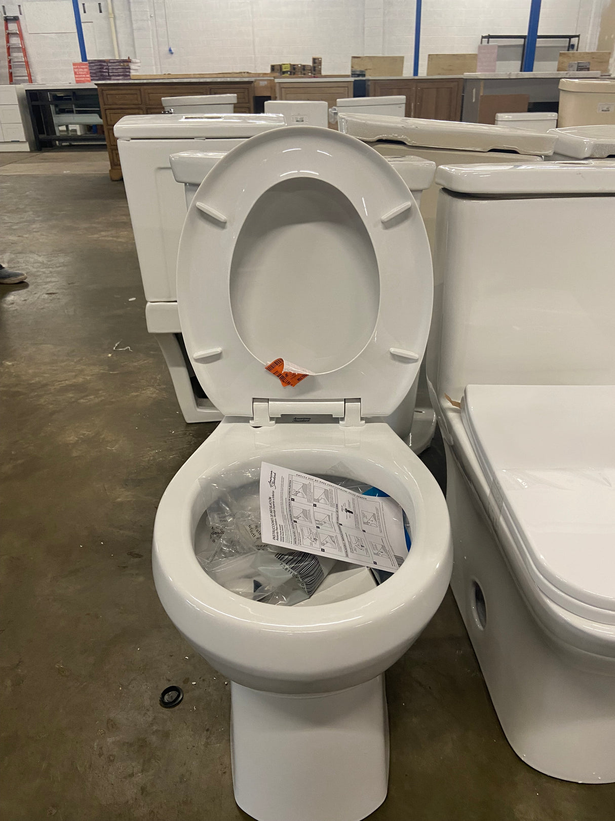 Wall-Hung Round Toilet Bowl Only in. White, Seat Included