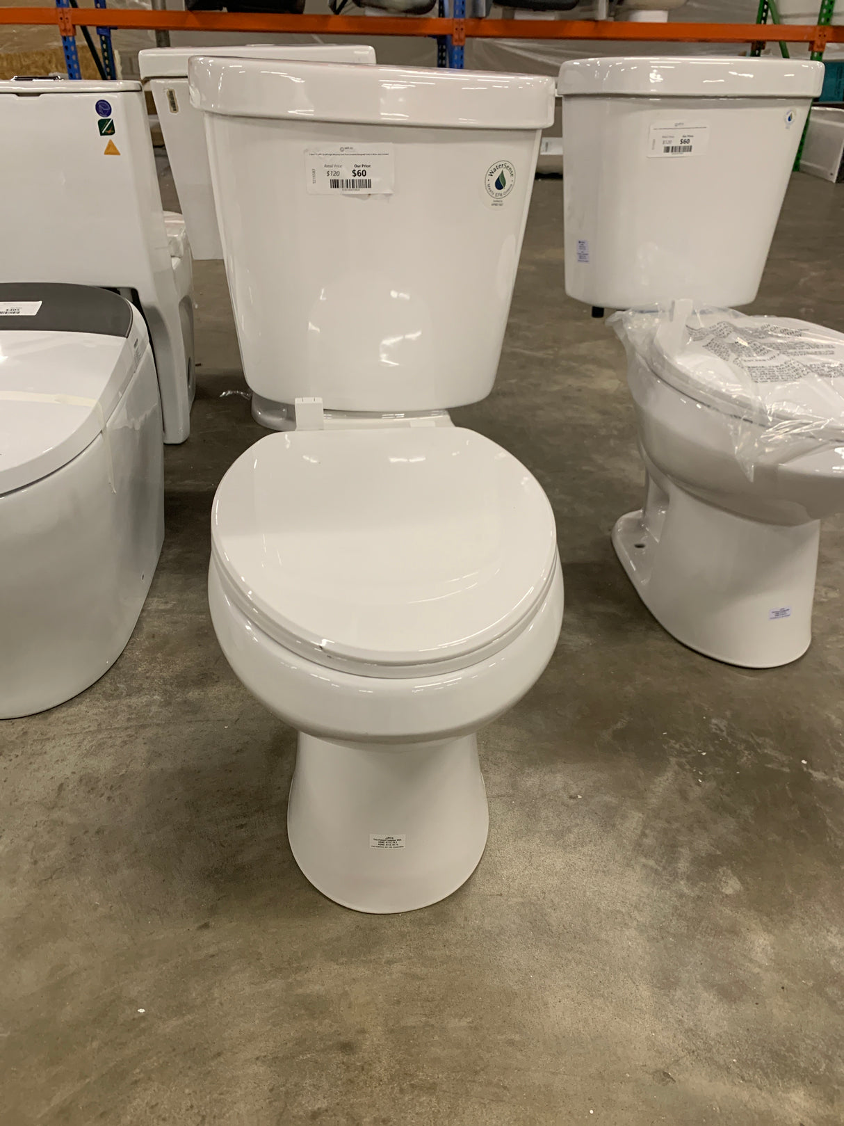 2-piece 1.1 GPF/1.6 GPF High Efficiency Dual Flush Complete Elongated Toilet in White, Seat Included