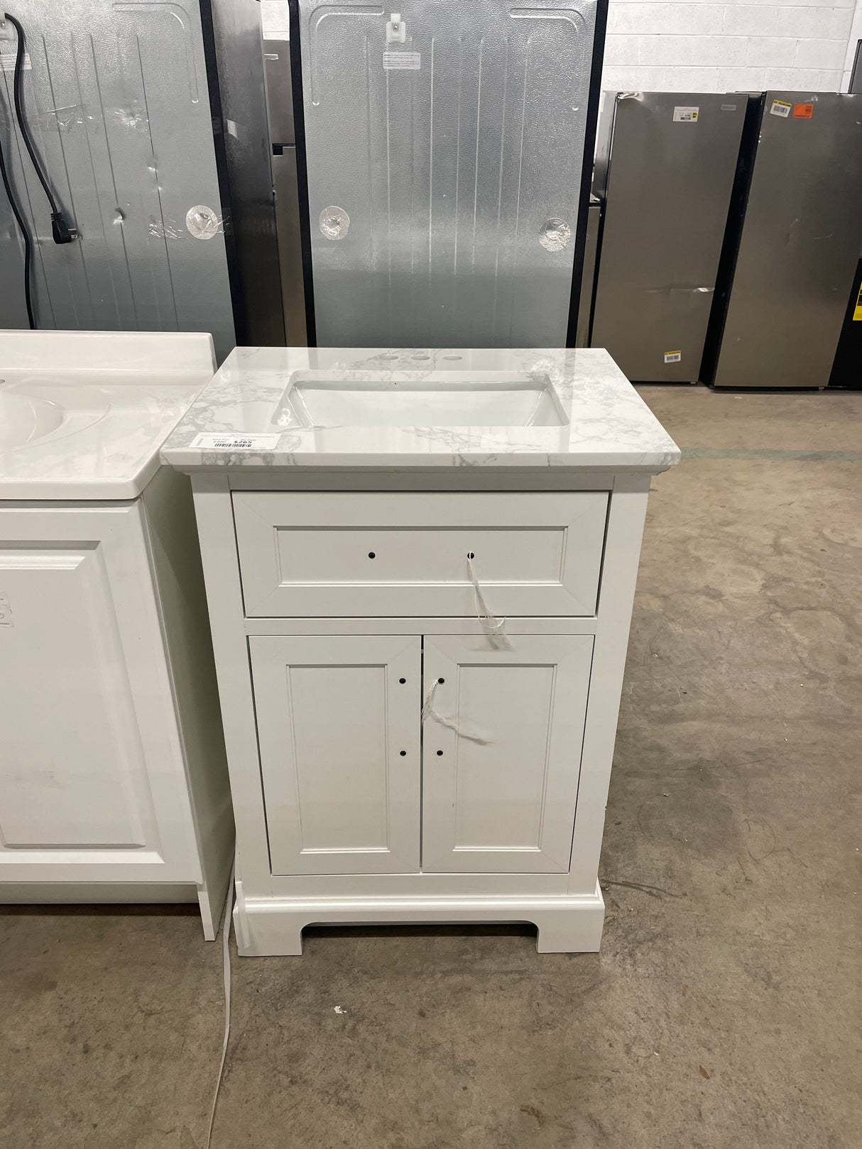 Doveton 24 in. W x 19 in. D x 34 in. H Single Sink Bath Vanity in White with White Engineered Marble Top