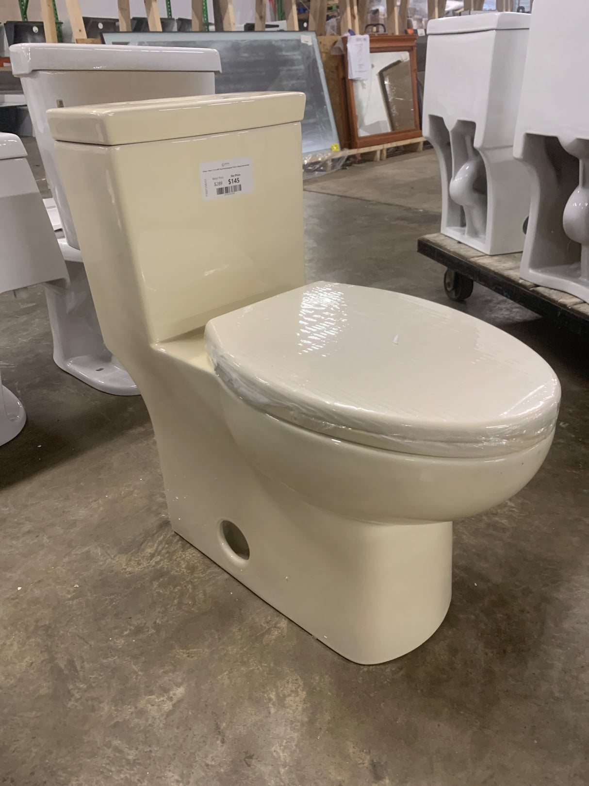 Classe 1-Piece 1.1/1.6 GPF Dual Flush Elongated Toilet in Bisque Seat Included