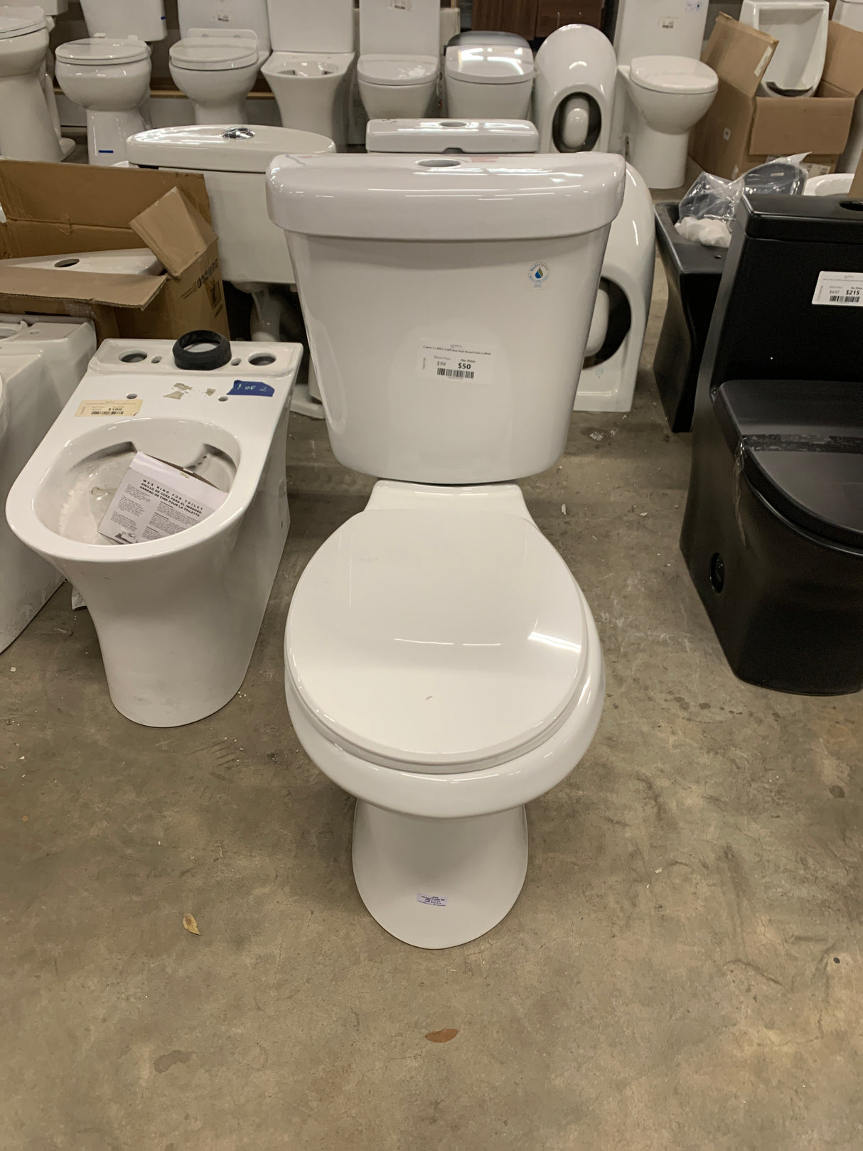 2-piece 1.1 GPF/1.6 GPF Dual Flush Round Toilet in White