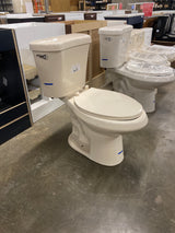 2-piece 1.28 GPF High Efficiency Single Flush Elongated Toilet in Bone