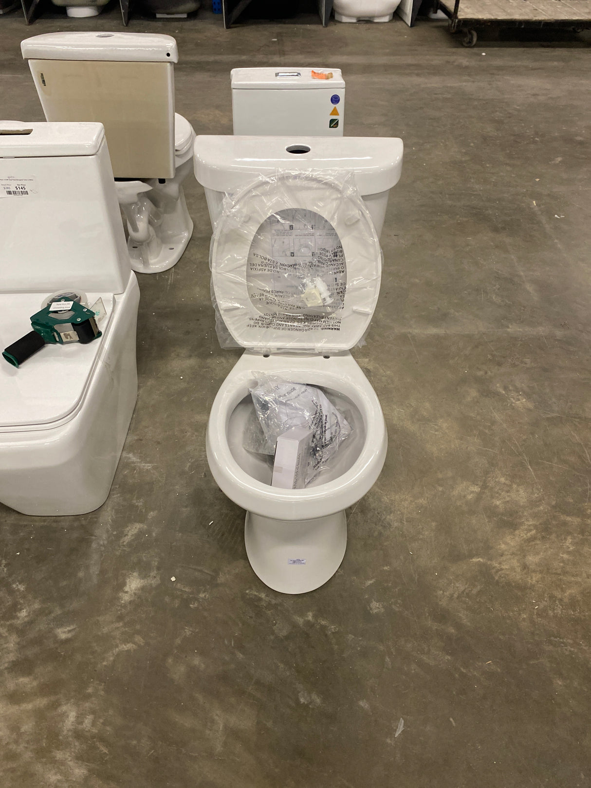 2-piece 1.1 GPF/1.6 GPF Dual Flush Round Toilet in White