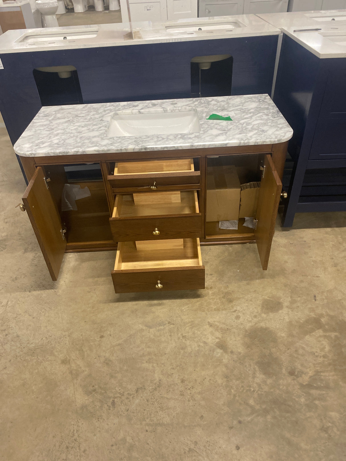 Collette 48 in W x 22 in D x 35 in H Single Sink Bath Vanity in Cinnamon Oak With White Carrara Marble Top
