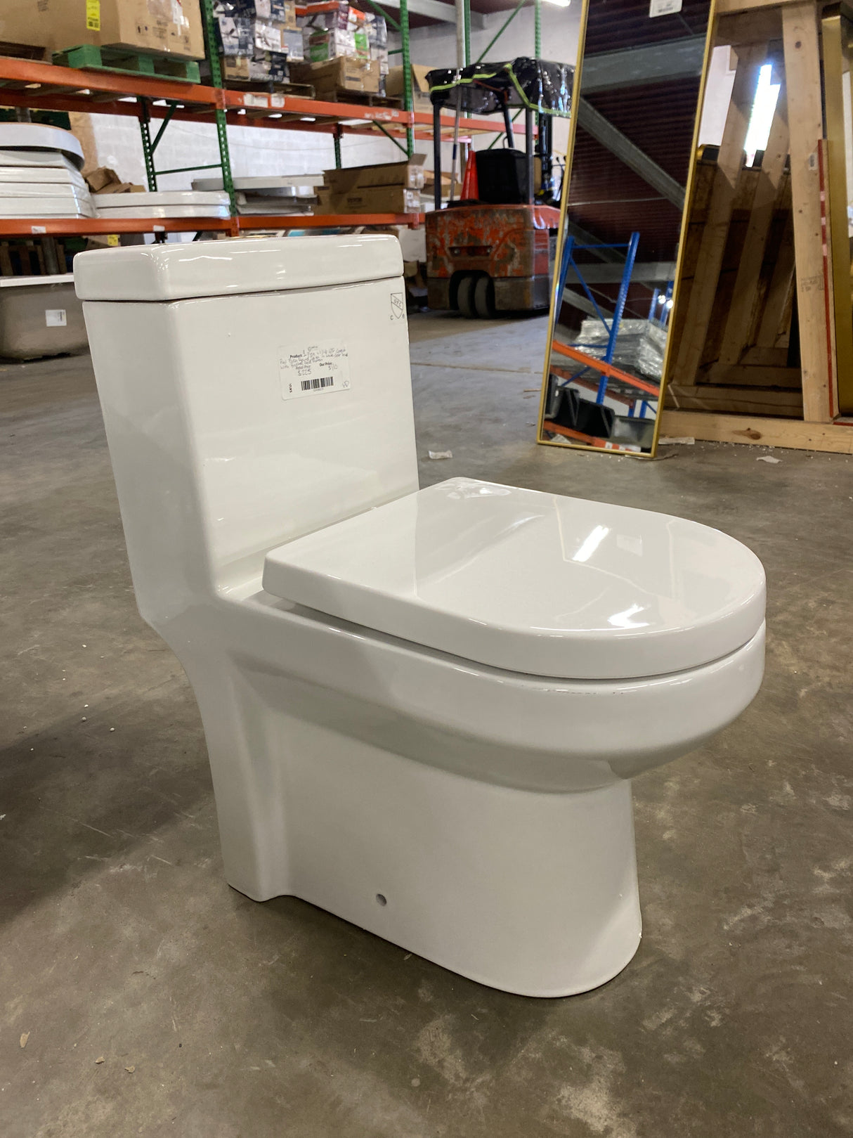 1-Piece 1.1/1.6 GPF Compact Dual Flush Round Toilet in White, Seat Included, with Brushed Gold Button