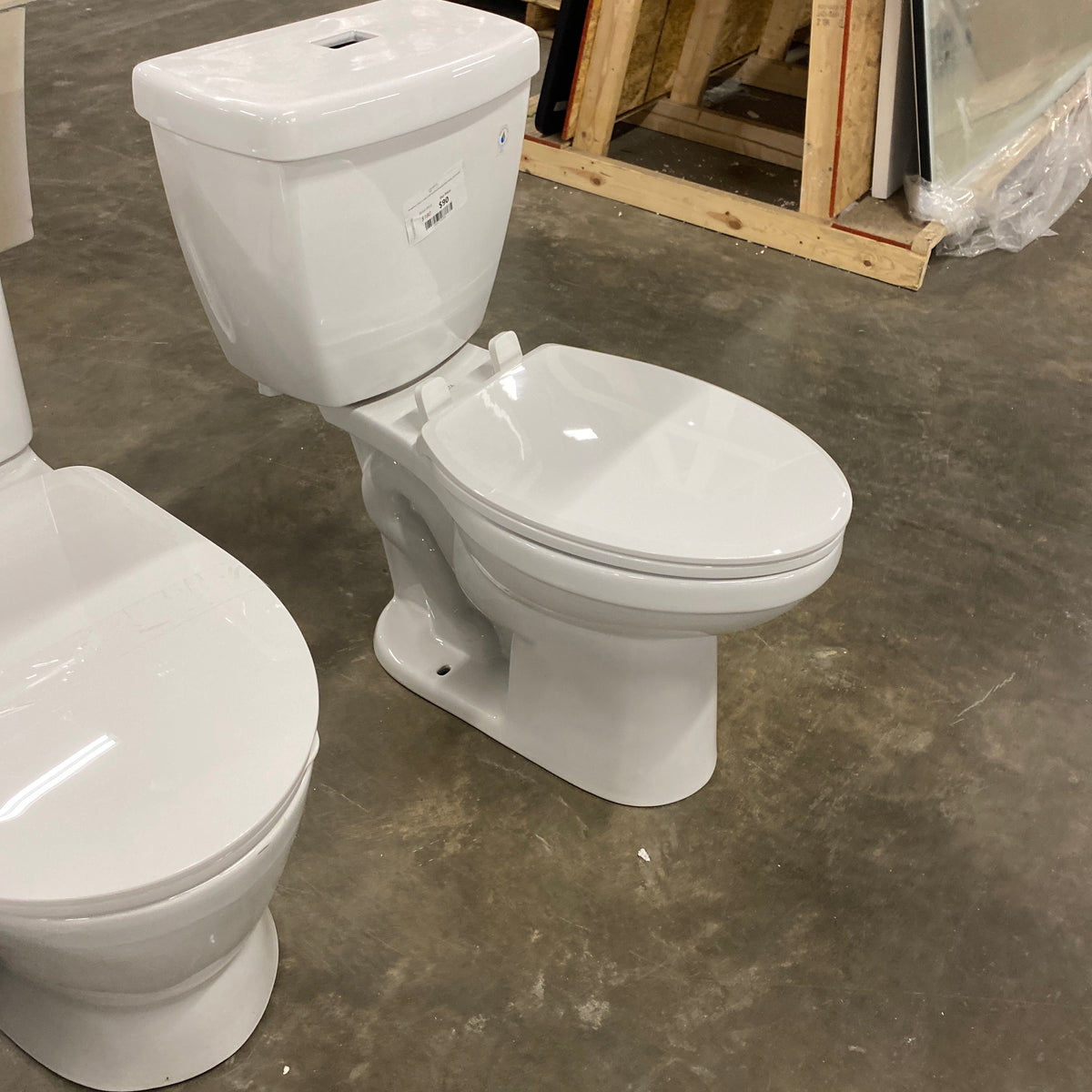 Foundations 2piece 1.1 GPF/1.6 GPF Dual Flush Elongated Toilet in Whi