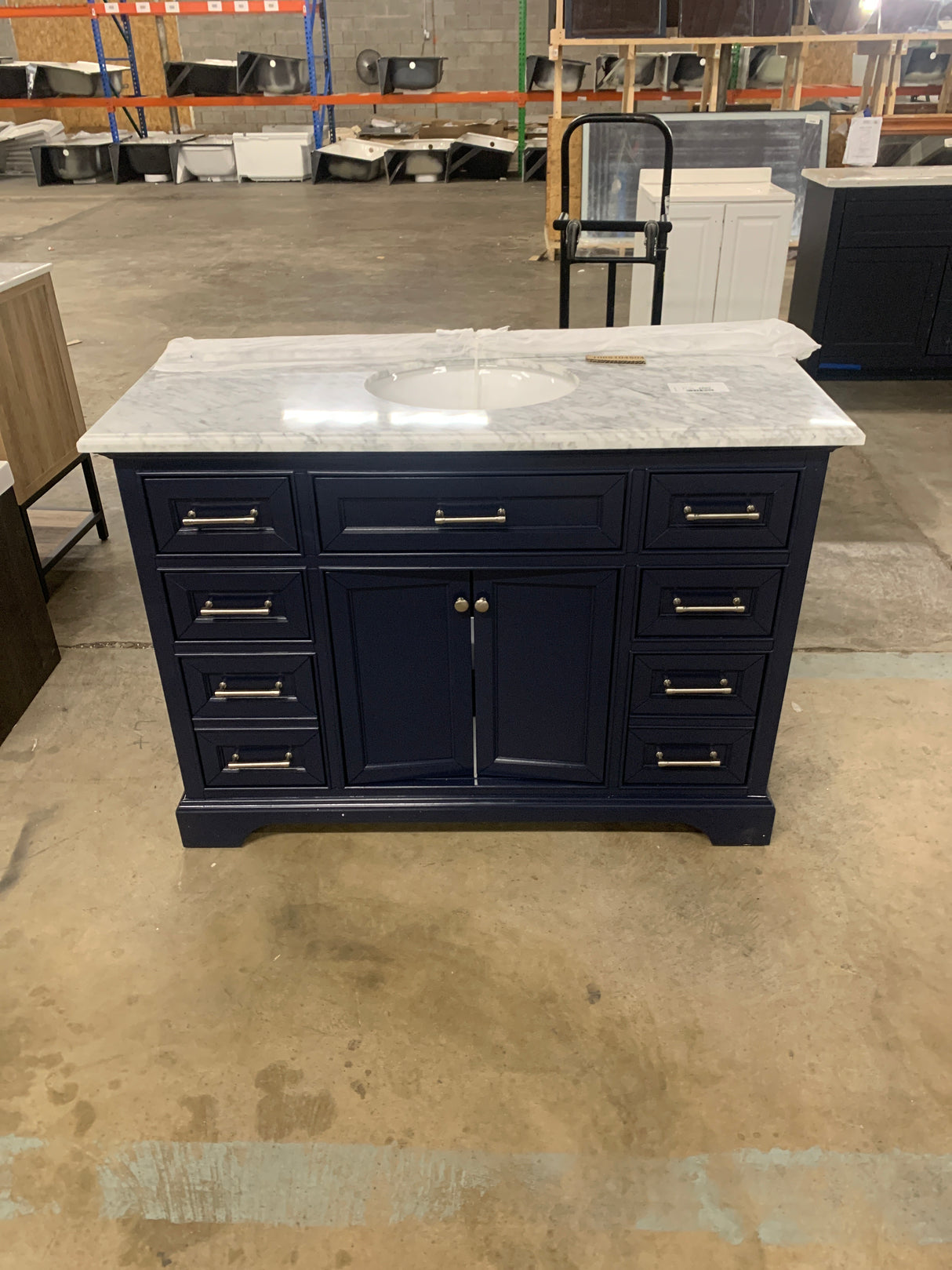 Windlowe 49 in. W x 22 in. D x 35 in. H Freestanding Bath Vanity in Navy Blue with Carrara White Marble Top