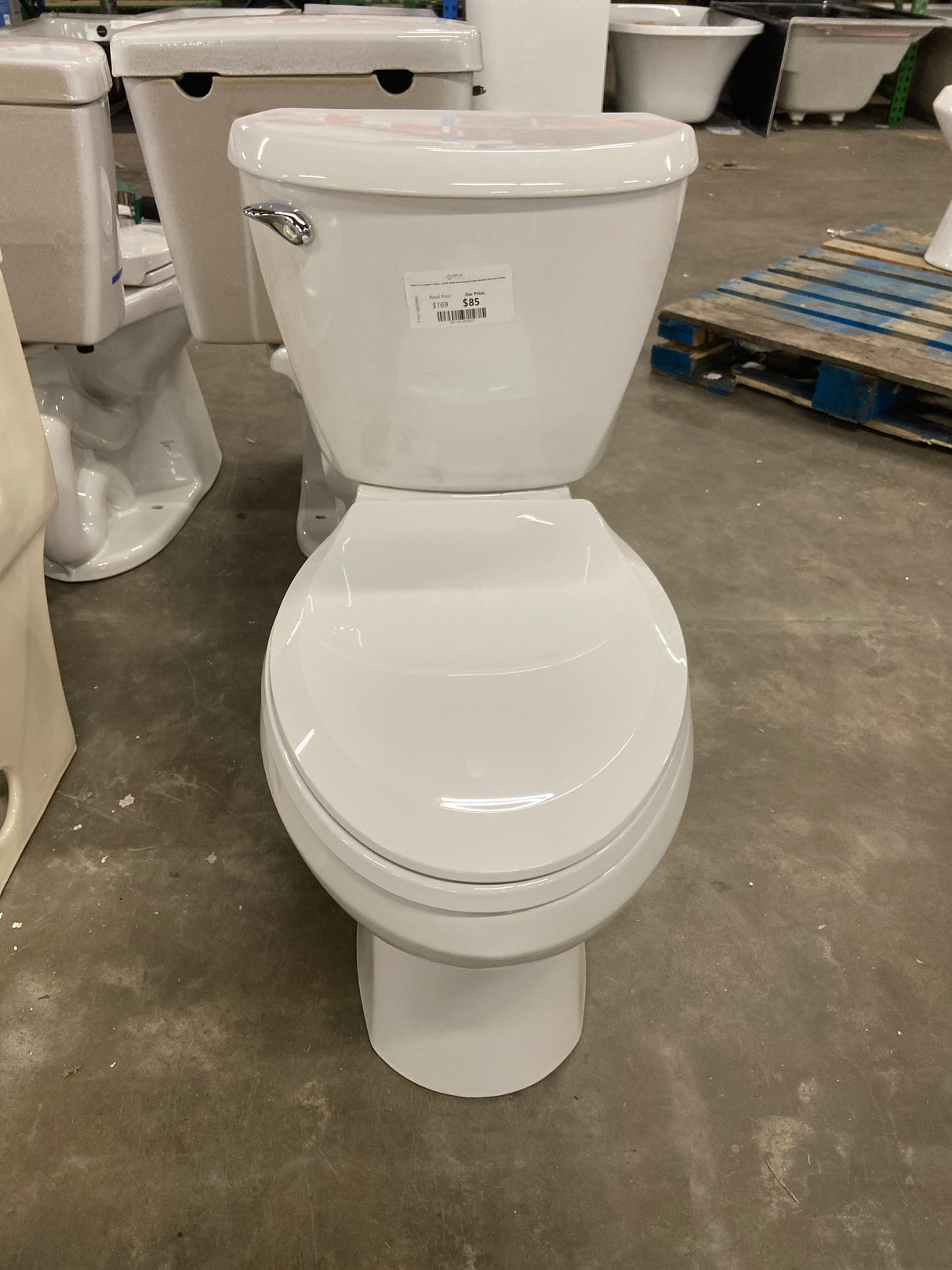 Reliant 12 in. Rough In 2-Piece 1.28 GPF Single Flush Elongated Toilet with Slow Close Seat in White