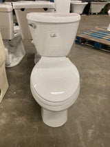 Reliant 12 in. Rough In 2-Piece 1.28 GPF Single Flush Elongated Toilet with Slow Close Seat in White