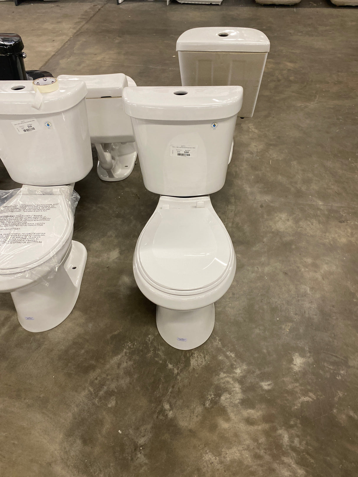 2-piece 1.1 GPF/1.6 GPF Dual Flush Round Toilet in White