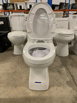 Power Flush 1-piece 1.28 GPF Single-Flush Elongated Toilet in White Seat Included