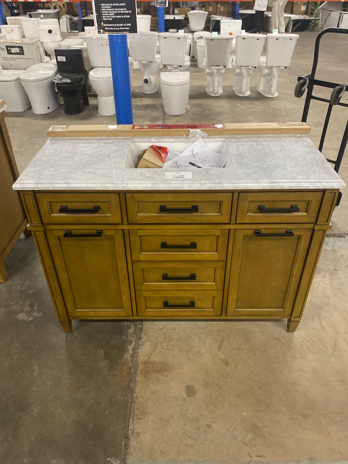 Caville 48 in. W x 22 in. D x 34.50 in. H Bath Vanity in Almond Latte with Carrara Marble Top