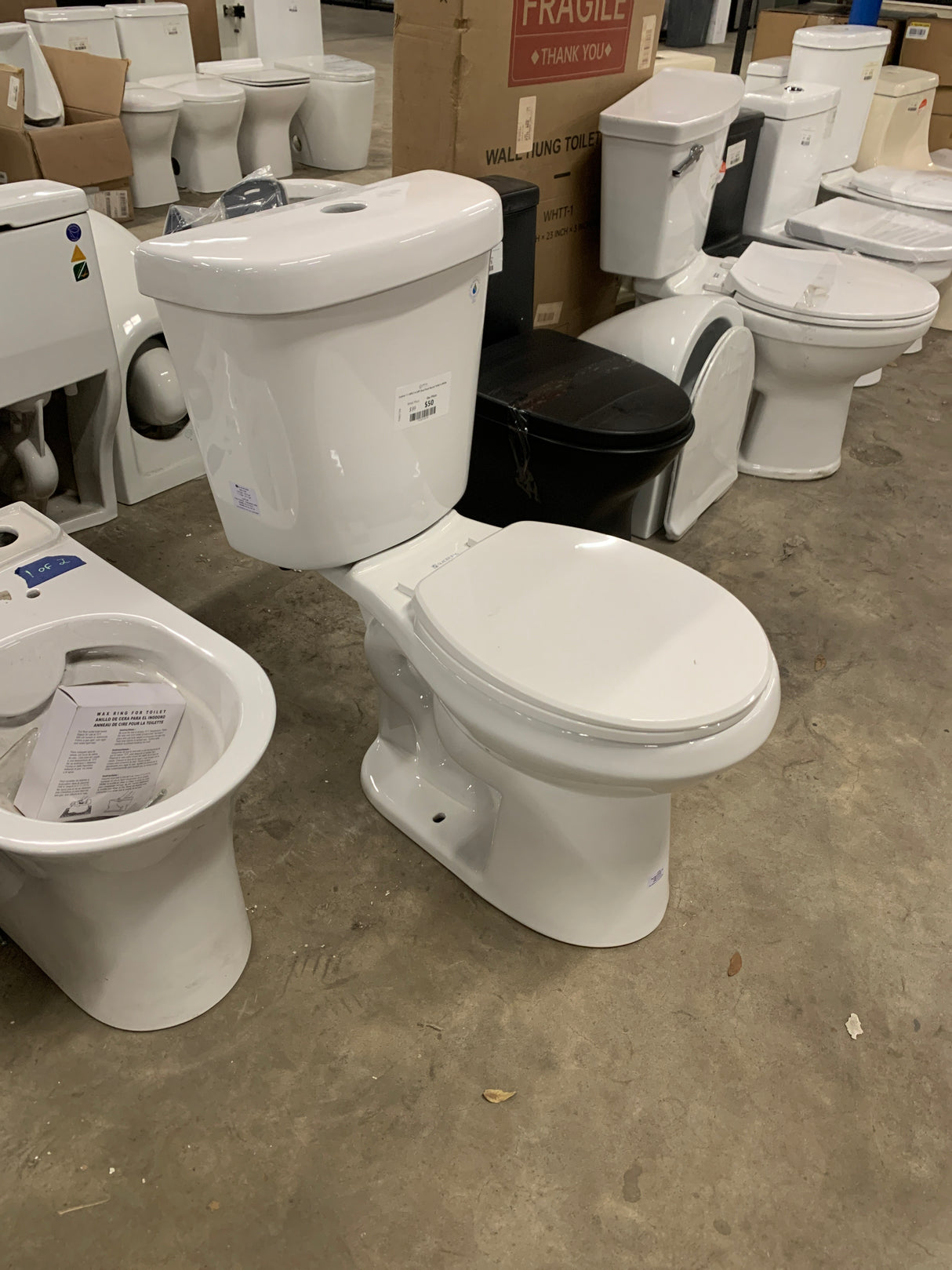 2-piece 1.1 GPF/1.6 GPF Dual Flush Round Toilet in White