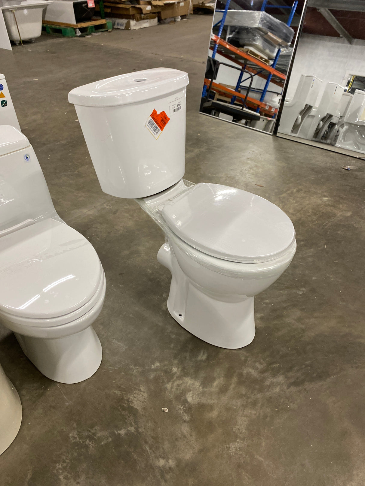 19 in. 2-Piece 1.0/1.6 GPF Rear-Outlet Dual Flush Elongated High Toilet in White (Seat Included)