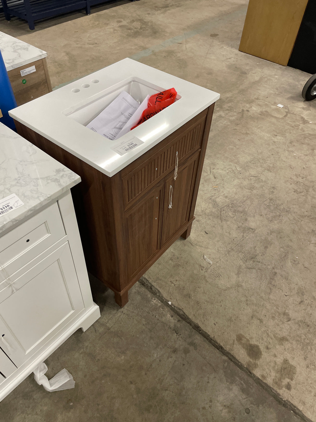 Riley 24 in. Single Sink Freestanding Spiced Walnut Bath Vanity with White Engineered Stone Top (Assembled)