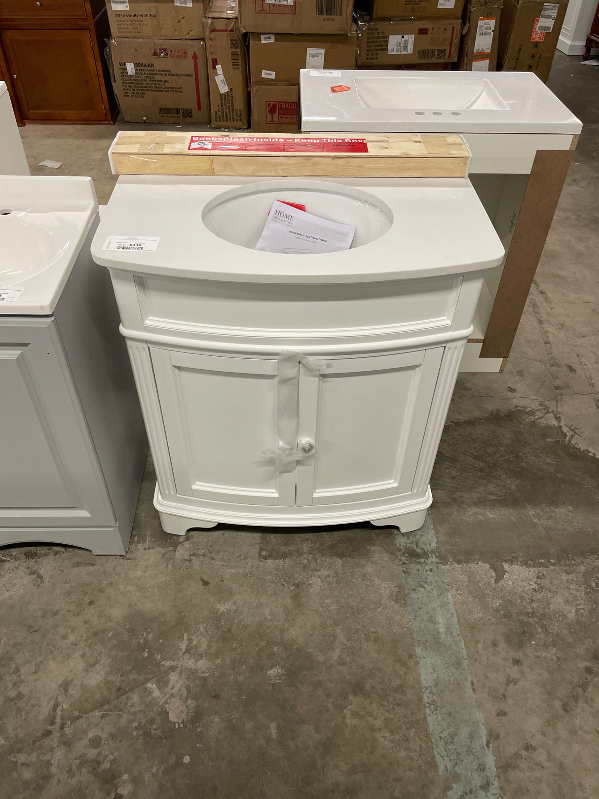 Terryn 31 in. W x 20 in. D x 35 in. H Vanity in White with Engineered White Marble Top and White Sink