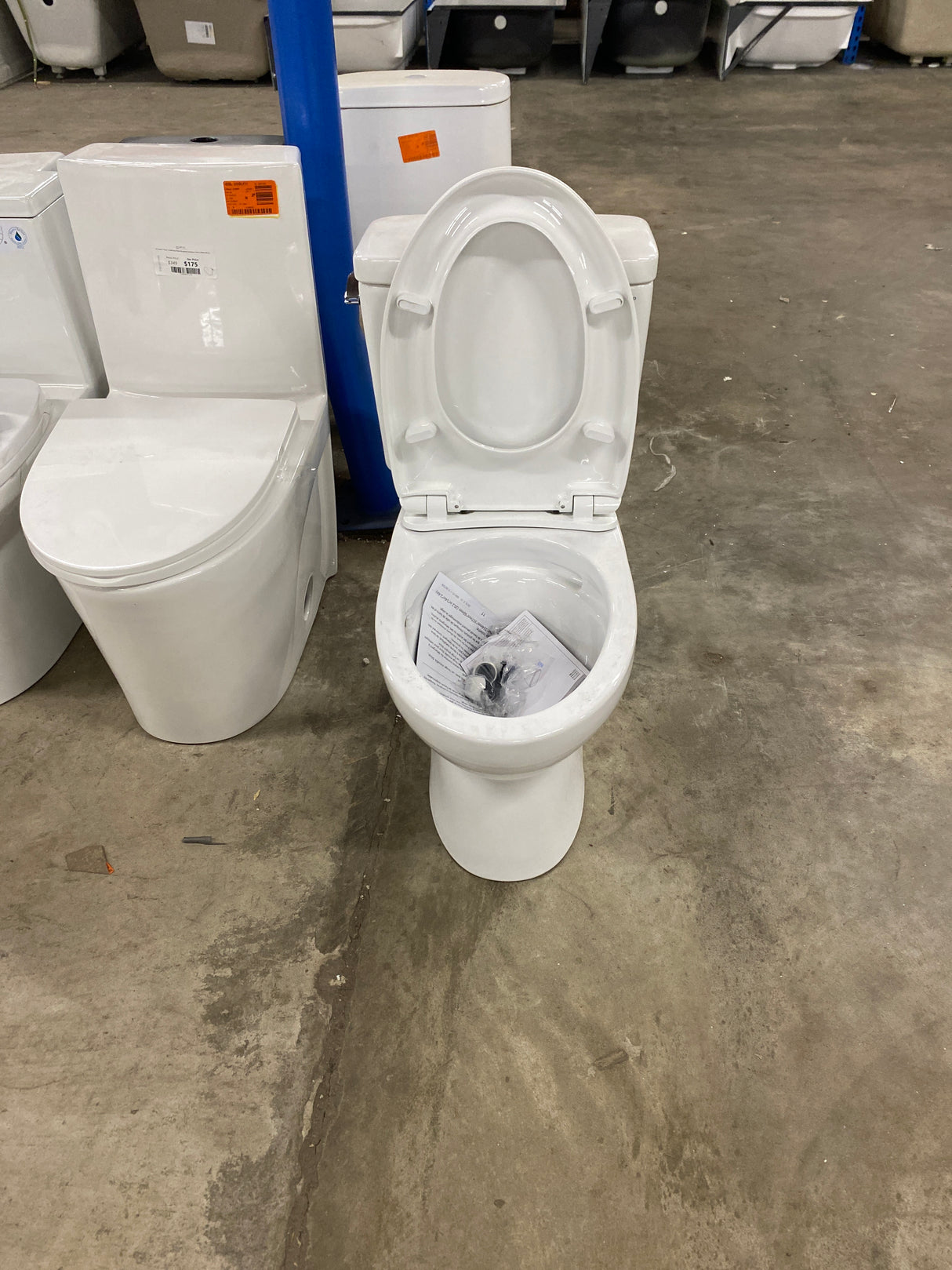 Drake 2-Piece 1.6 GPF Single Flush Elongated Standard Height Toilet in Cotton White, SoftClose Seat Included