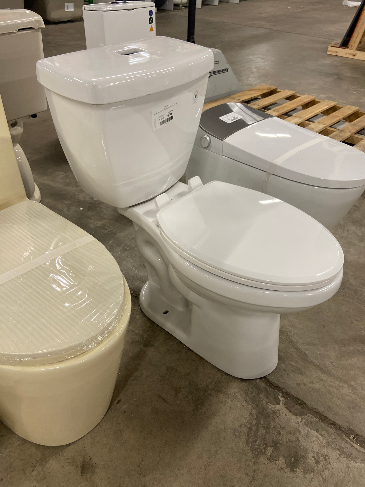 Foundations 2-piece 1.1 GPF/1.6 GPF Dual Flush Elongated Toilet in White, Seat Included