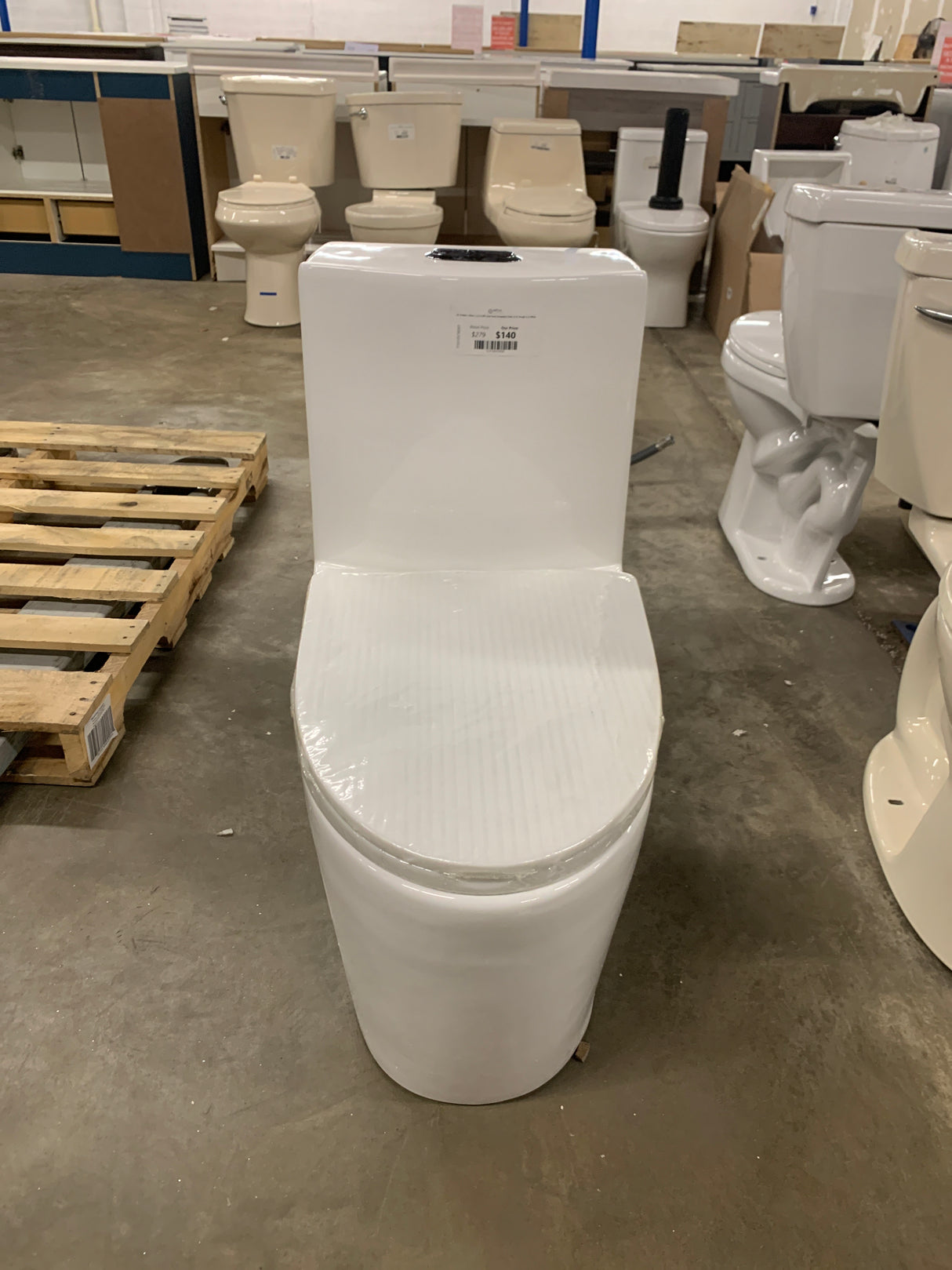 St. Tropez 1-Piece 1.1/1.6 GPF Dual Flush Elongated Toilet 14 in. Rough-In in White