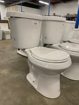 2-piece 1.1 GPF/1.6 GPF Dual Flush Round Toilet in White