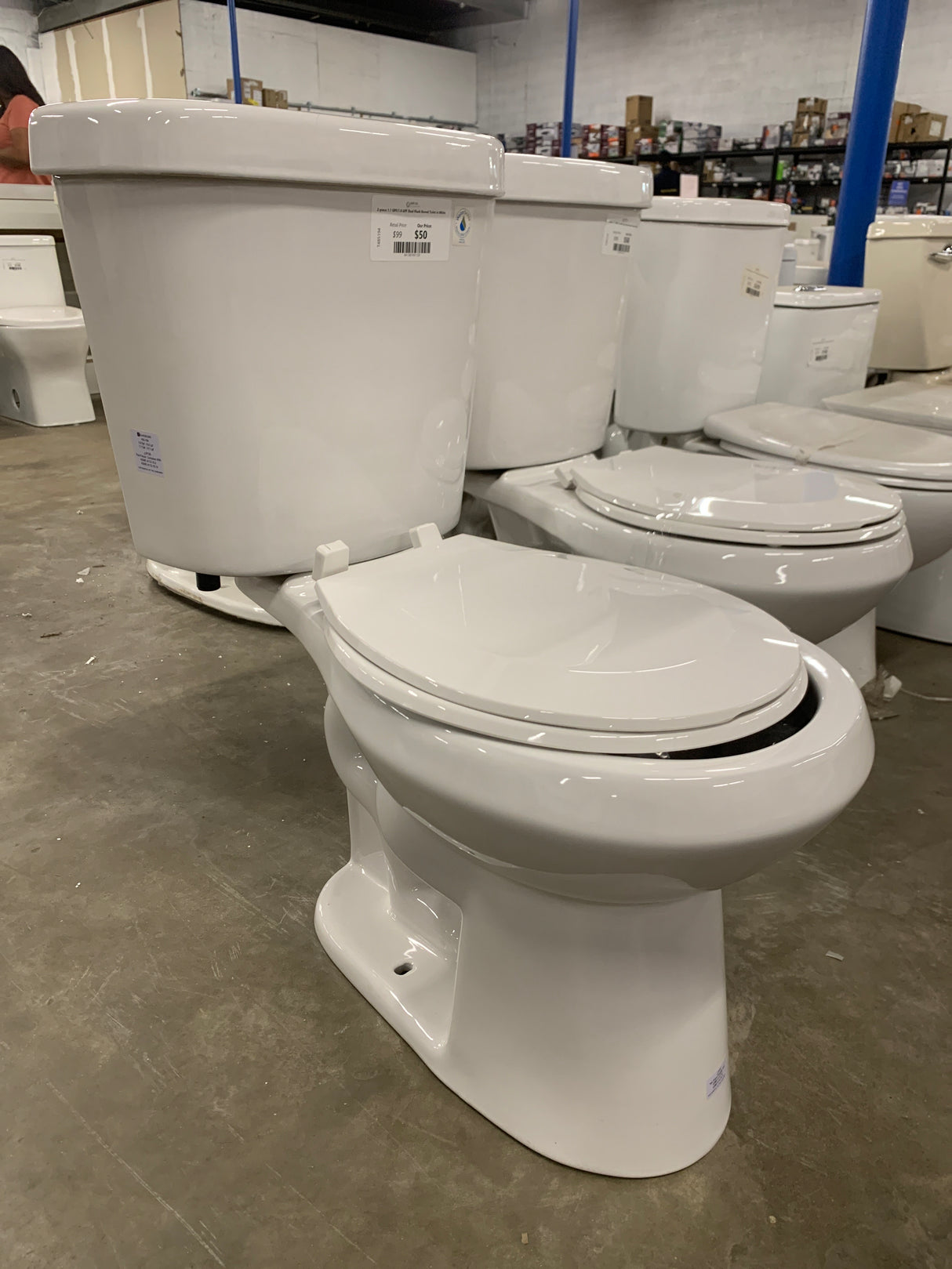 2-piece 1.1 GPF/1.6 GPF Dual Flush Round Toilet in White