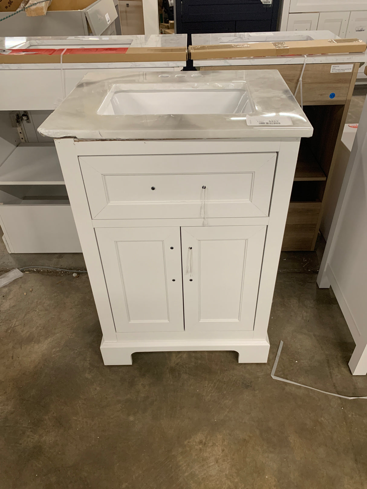 Doveton 24 in. W x 19 in. D x 34 in. H Single Sink Bath Vanity in White with White Engineered Marble Top