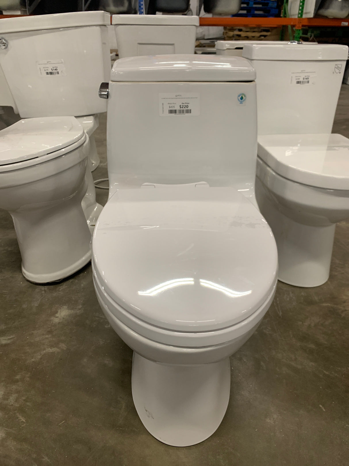 Eco UltraMax 1-Piece 1.28 GPF Single Flush Elongated Standard Height Toilet in Cotton White, SoftClose Seat Included